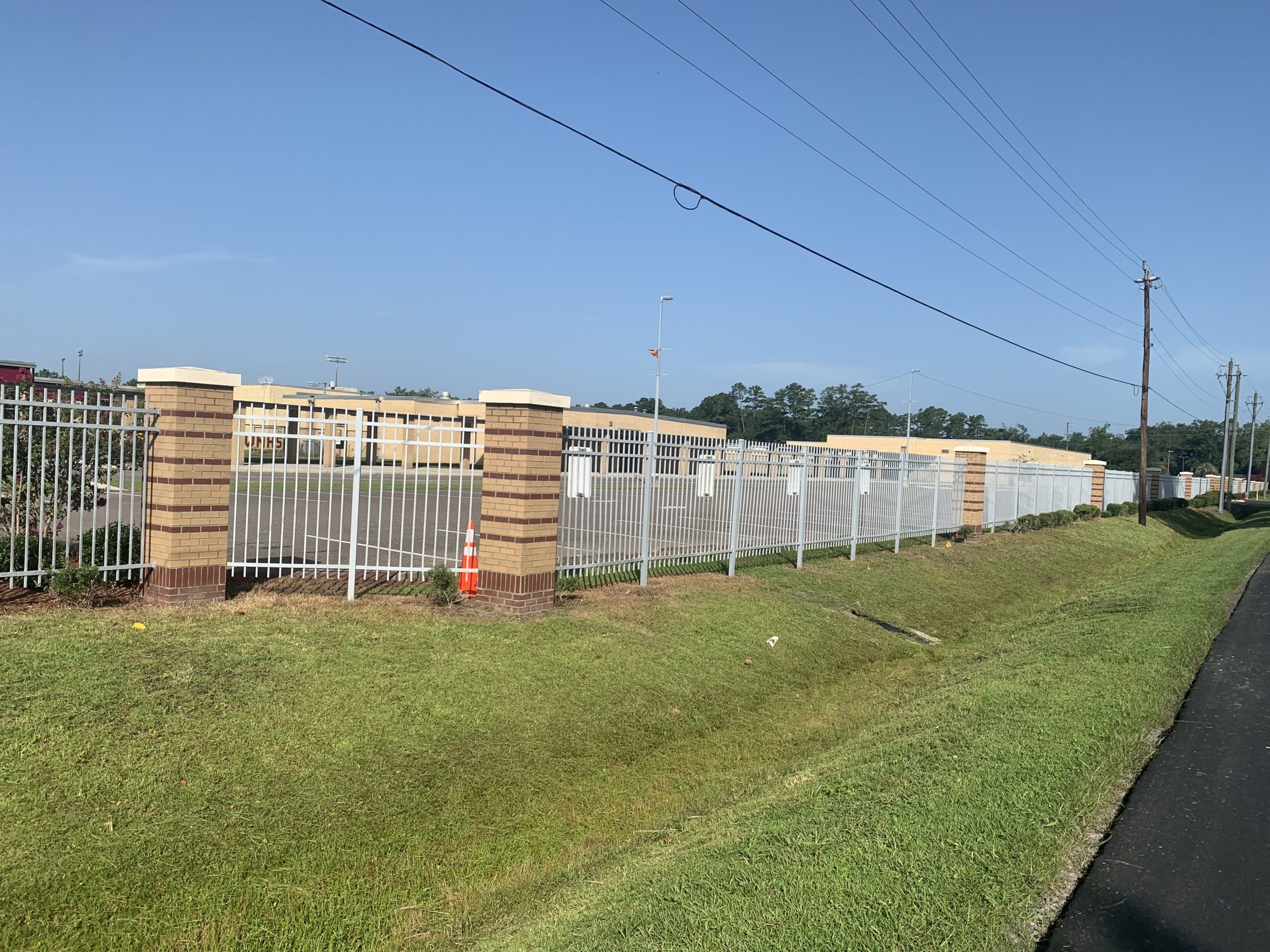 High School fence line and ditch